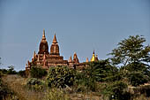 The cluster of red brick temples, named Khay-min-gha on the map on the North plain of Bagan. Myanmar. 